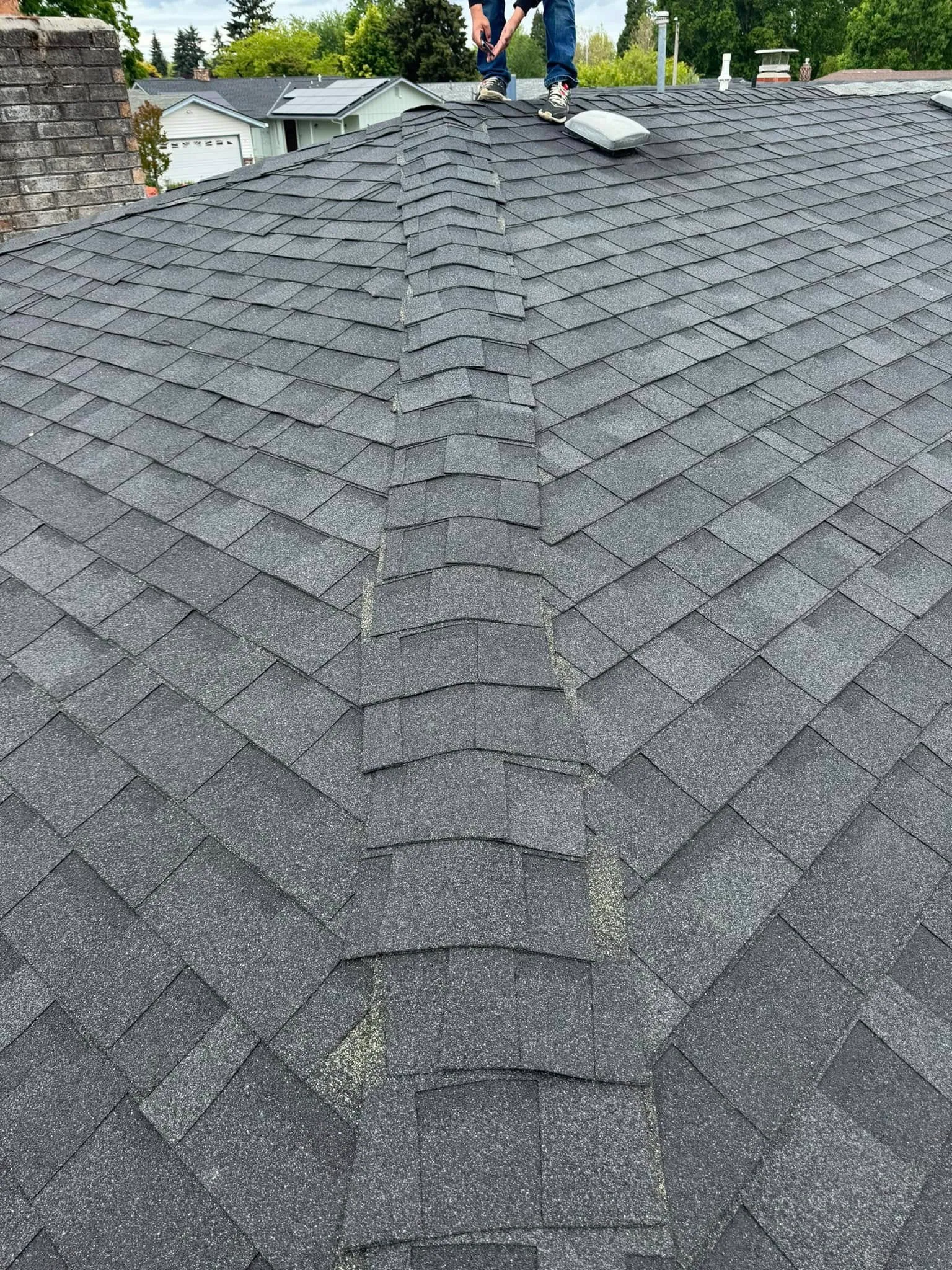 A new architectural shingle roof and ridge cap